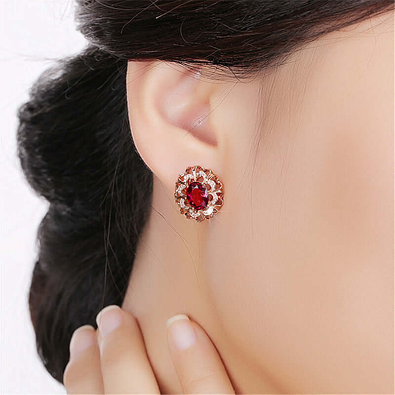 Elegant 18K Gold Tourmaline Earrings showcased on a model&