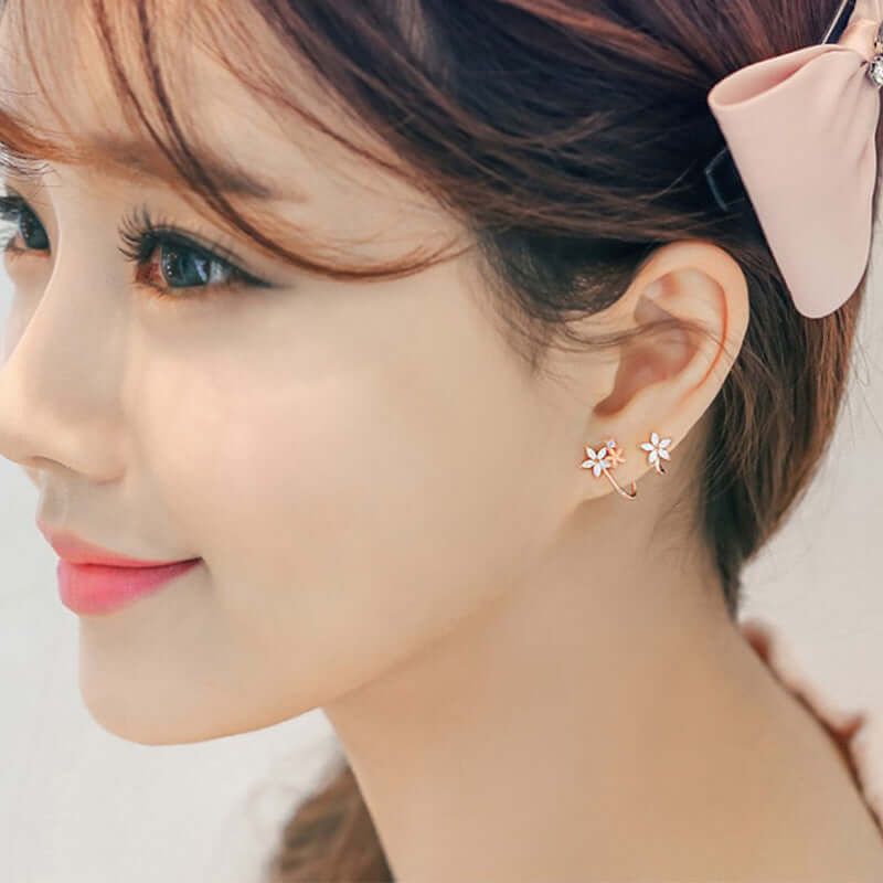 Short Hair Earrings worn by a woman with flower design, showcasing elegant and delicate style for everyday wear.