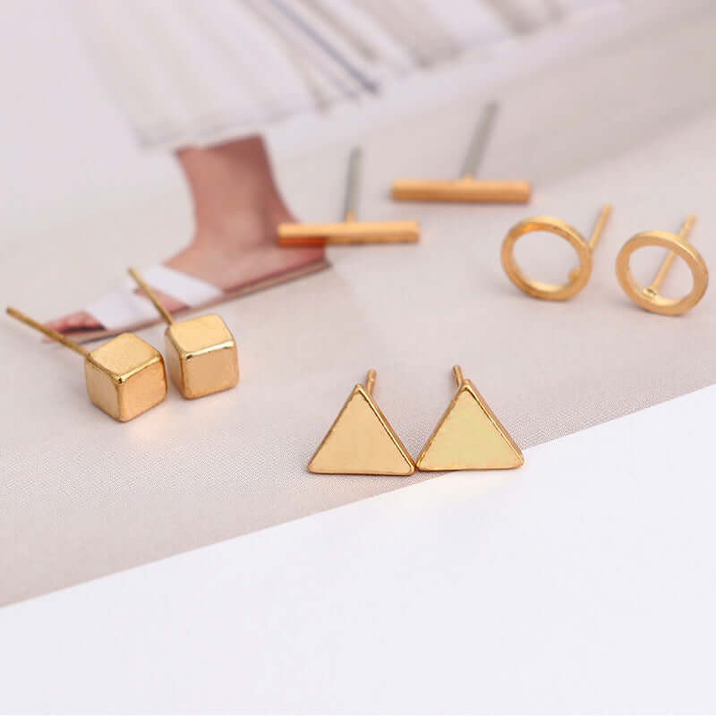 Geometric stud earrings triangular design gold
