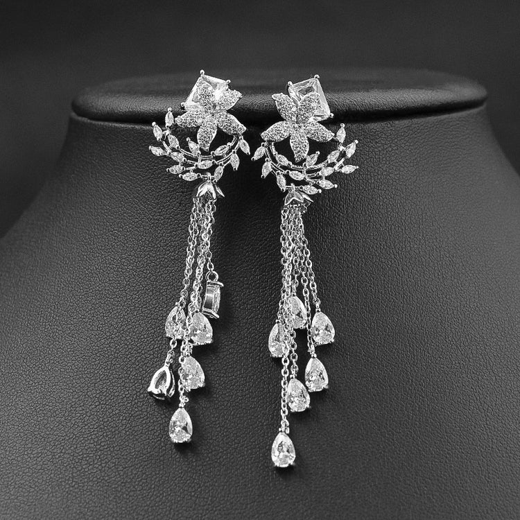 Emerald green gemstone earrings with elegant gemstone detailing